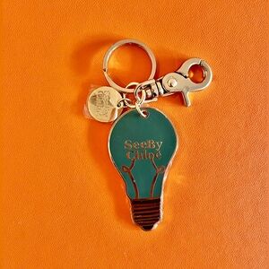 See By Chloé light bulb keychain charm New